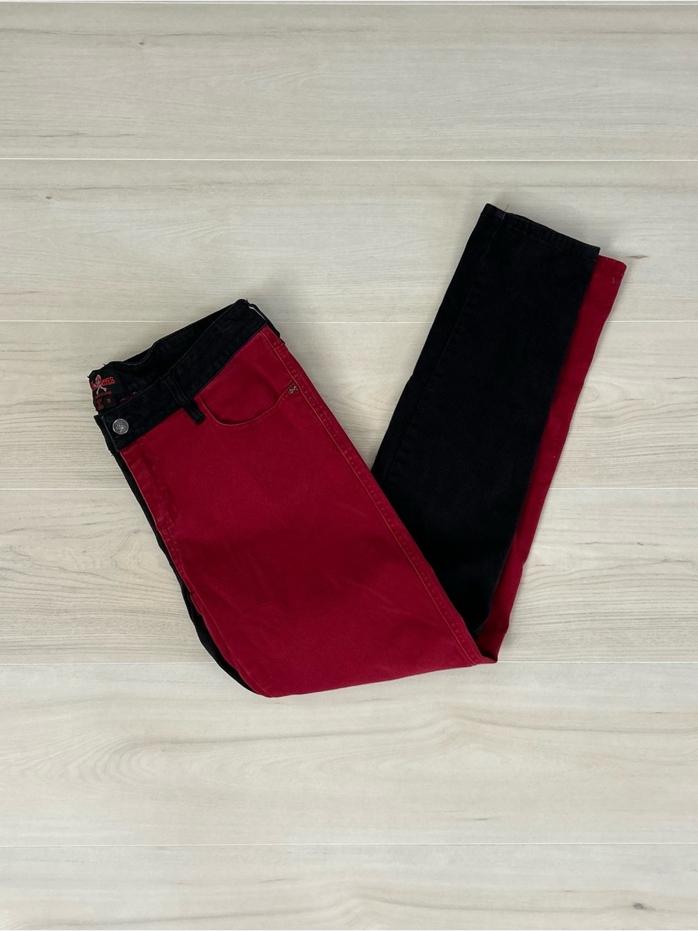red and black two tone royal bones pants